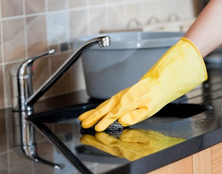Satisfied customer reviewing deep cleaning results