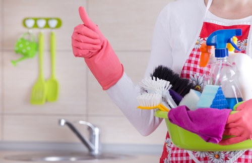 Satisfied customer enjoying a spotless home after Chiswick cleaning service