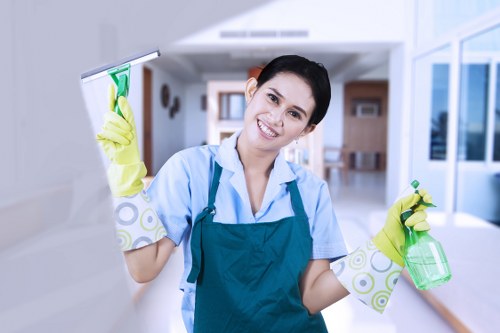 Satisfied clients in their spotless home after cleaning service